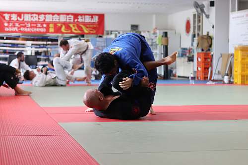 martial arts two men dueling inside room judo